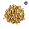 Circular pile of ginger. USDA Organic certification emblem 