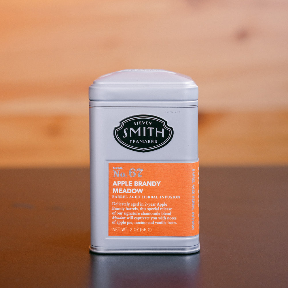 Grey tin of Apple Brandy Meadow with an orange label and Smith logo.