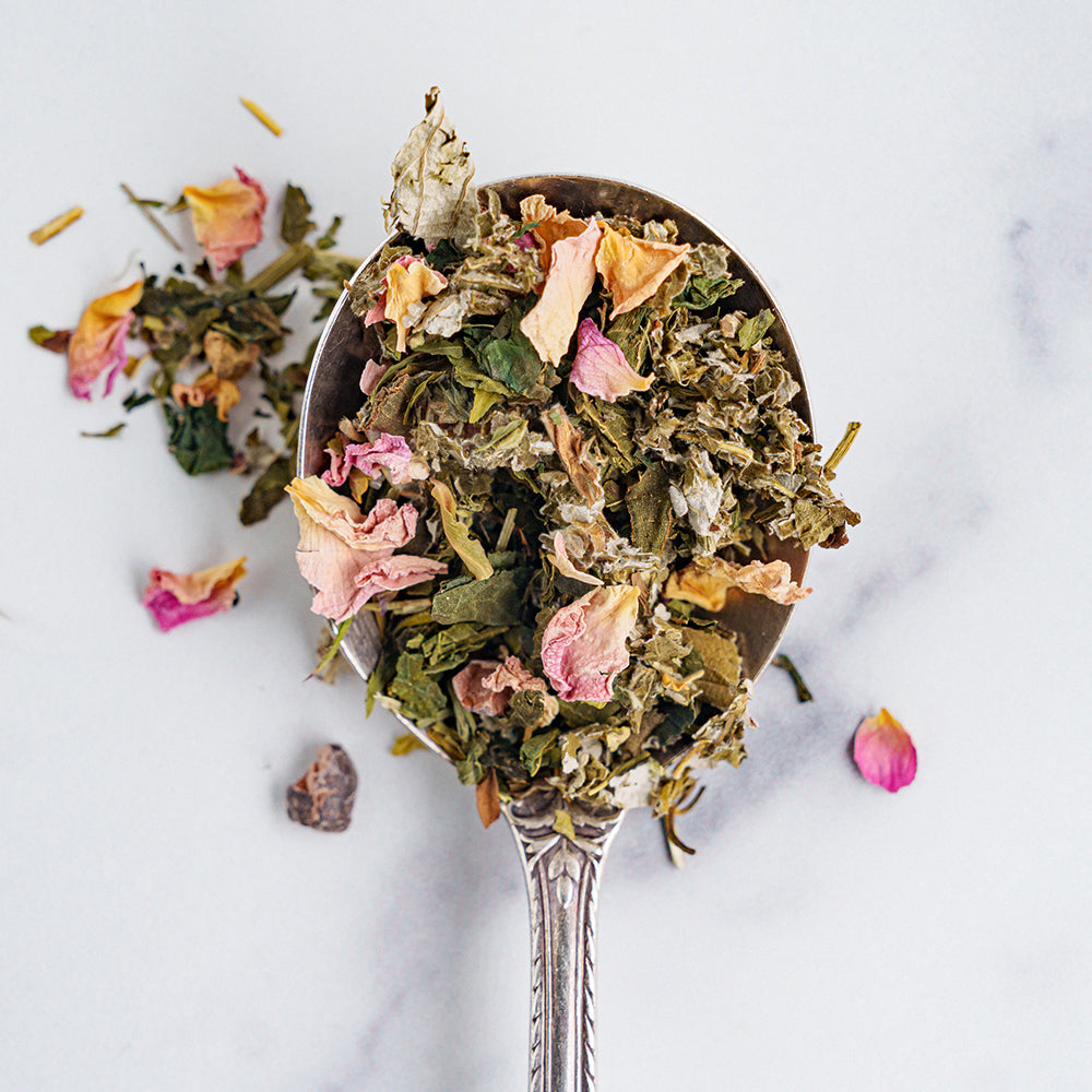 Spoon with tea ingredients